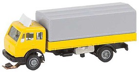 Faller 1989-1998 Mercedes-Benz SK Low-Side Truck with Canvas Tarp Car System Yellow, Gray N-Scale Faller 1989-1998 Mercedes-Benz SK Low-Side Truck with Canvas Tarp Car System Yellow, Gray N-Scale