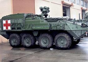 Trident ''Stryker'' ICV M1133 Medical Evacuation Vehicle HO Scale Model Roadway Vehicle #87091 Trident ''Stryker'' ICV M1133 Medical Evacuation Vehicle HO Scale Model Roadway Vehicle #87091