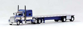 Trucks-N-Stuff Peterbilt 389 Tractor with 48' Spread-Axle Flatbed Trailer Assembled Blue, Cream Trucks-N-Stuff Peterbilt 389 Tractor with 48' Spread-Axle Flatbed Trailer Assembled Blue, Cream
