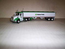 Trucks-N-Stuff Peterbilt 579 Day-Cab Tractor with Grain Trailer Assembled Nutrena Feeds (white, green, Old Logo) Trucks-N-Stuff Peterbilt 579 Day-Cab Tractor with Grain Trailer Assembled Nutrena Feeds (white, green, Old Logo)
