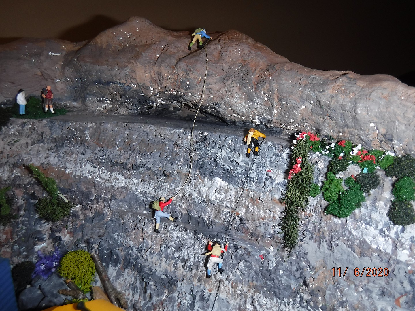 miniature mountain climber figures