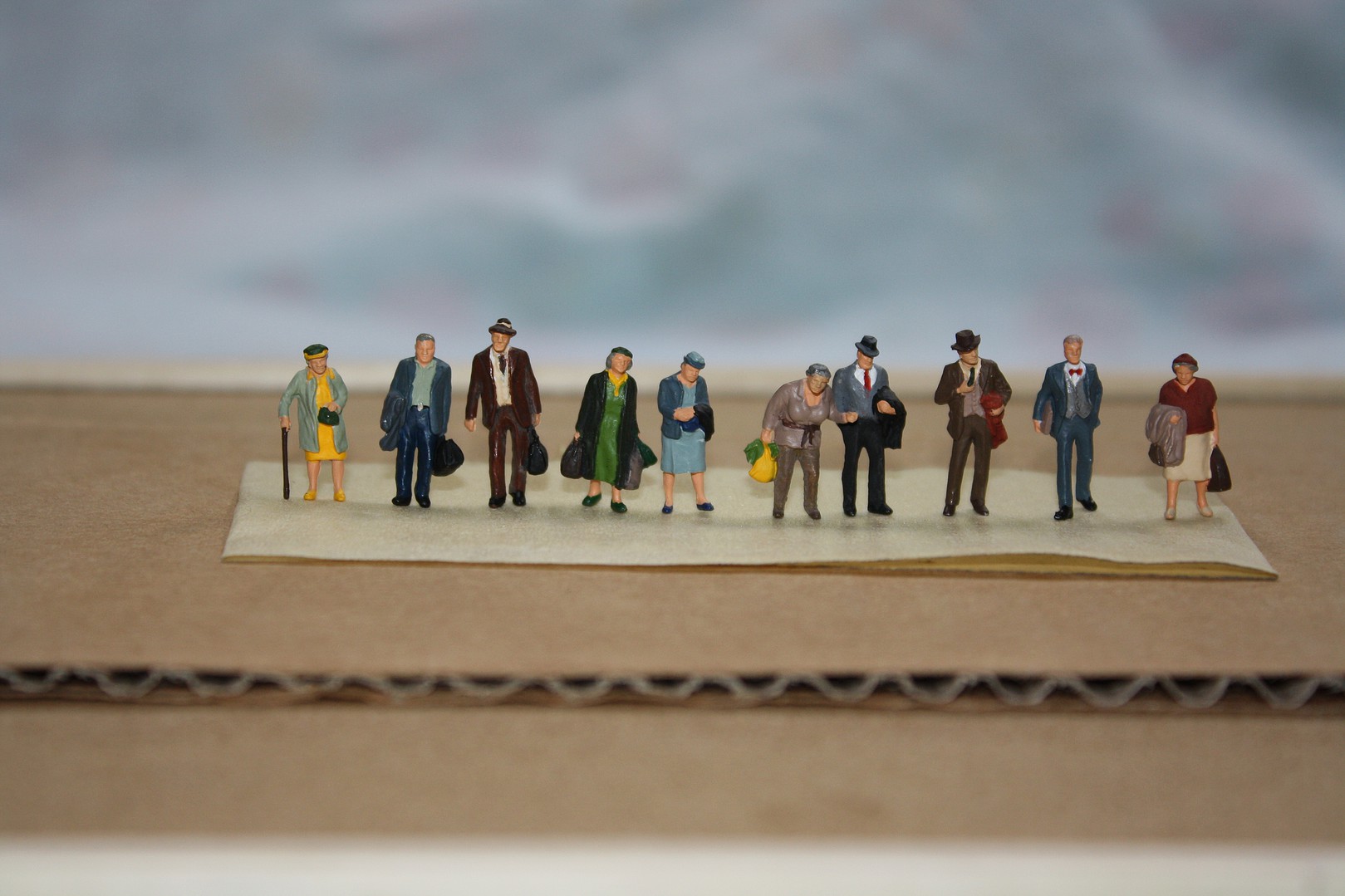Assorted Unpainted Figures At The Train Station Model Railroad